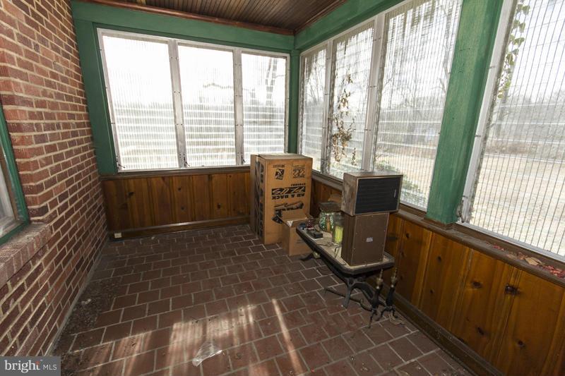402 Whitaker Mill Road Fallston, MD 21047 - Photo 27 of 29 a room with gym equipment and a large window