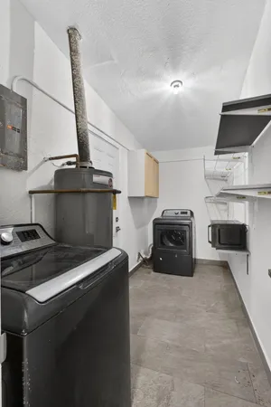 a kitchen with a stove and a microwave