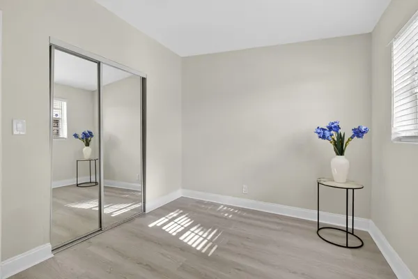 a view of an empty room and window