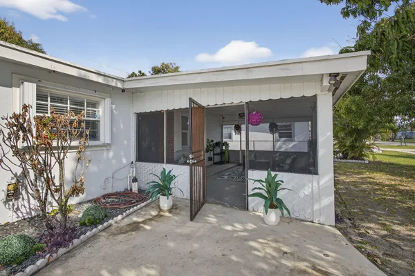 a view of a porch with seating space