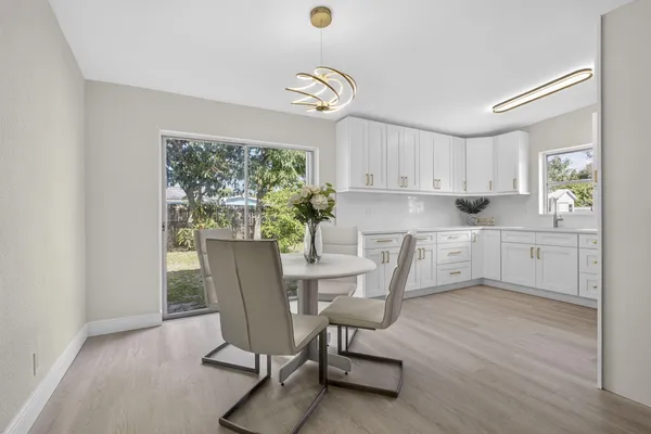 a living room with granite countertop furniture and a window