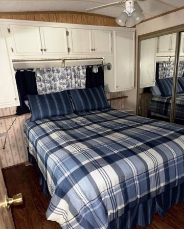 759 North Main Road, Unit V8J Otis, MA 01253 - Photo 14 of 21 a bedroom with a bed and wooden floor