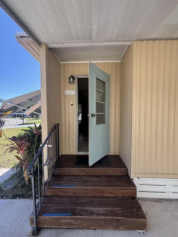 a view of entryway with a front door