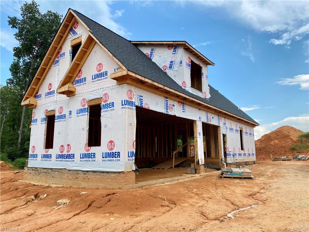 223 Pipers Ridge West Winston-Salem, NC 27127 - Photo 3 of 14 3 car garage with extra access door