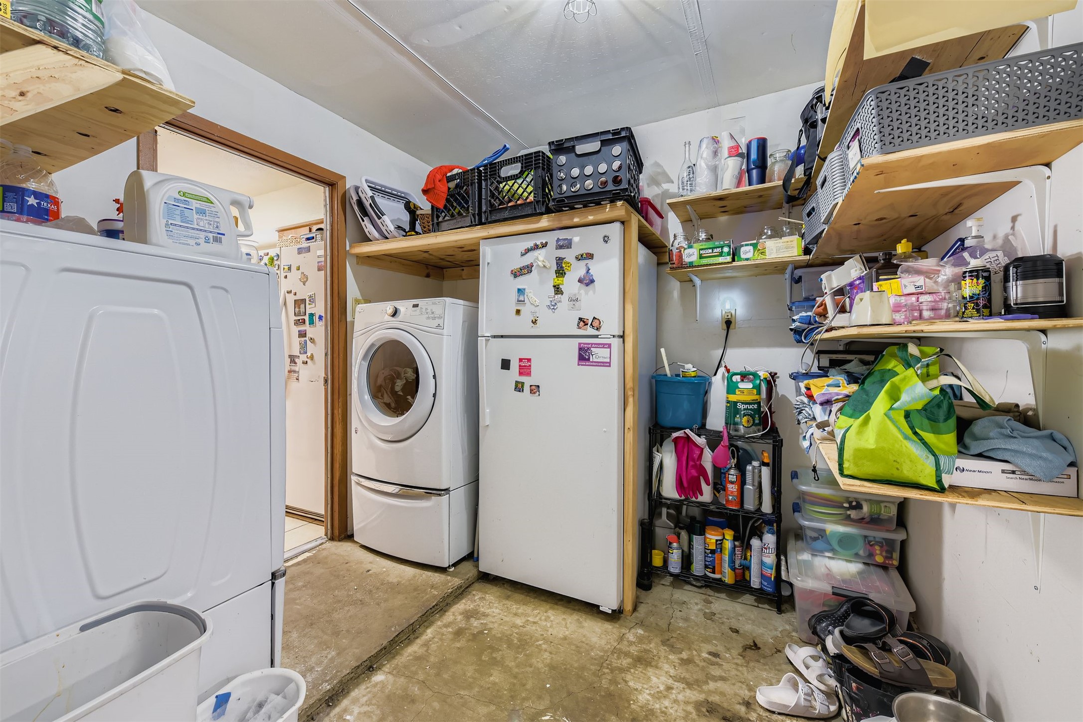 3104 Dominic Drive Austin, TX 78745 - Photo 22 of 28 Washroom with concrete flooring and washer and dryer