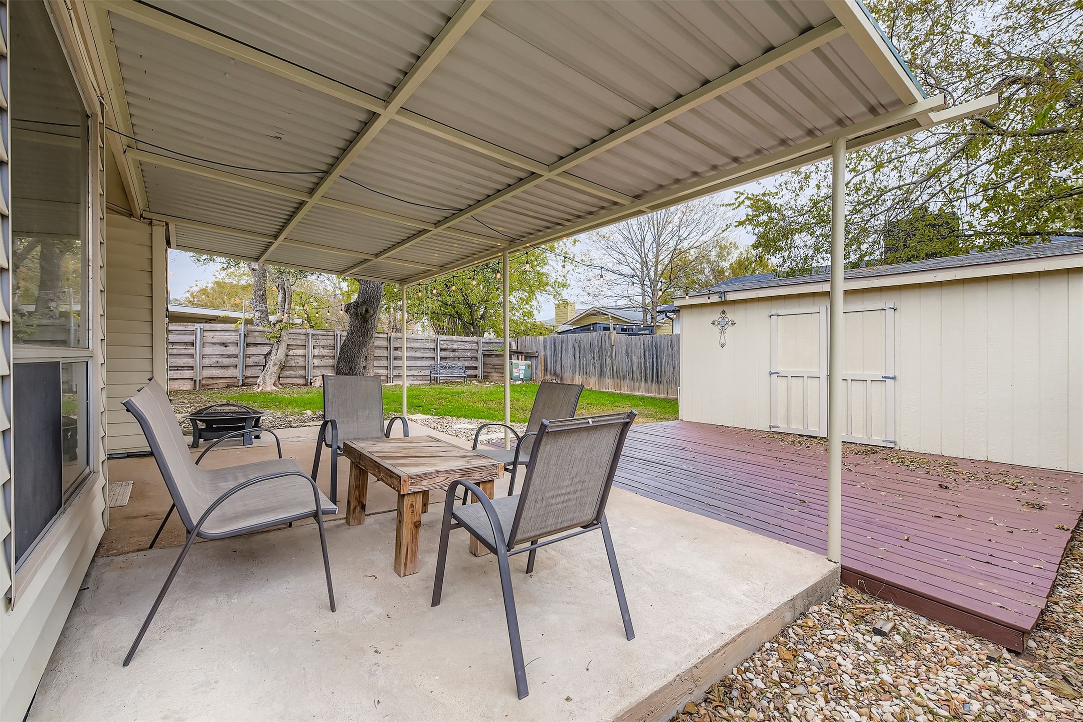 3104 Dominic Drive Austin, TX 78745 - Photo 23 of 28 Fenced backyard featuring a patio area and an outdoor structure