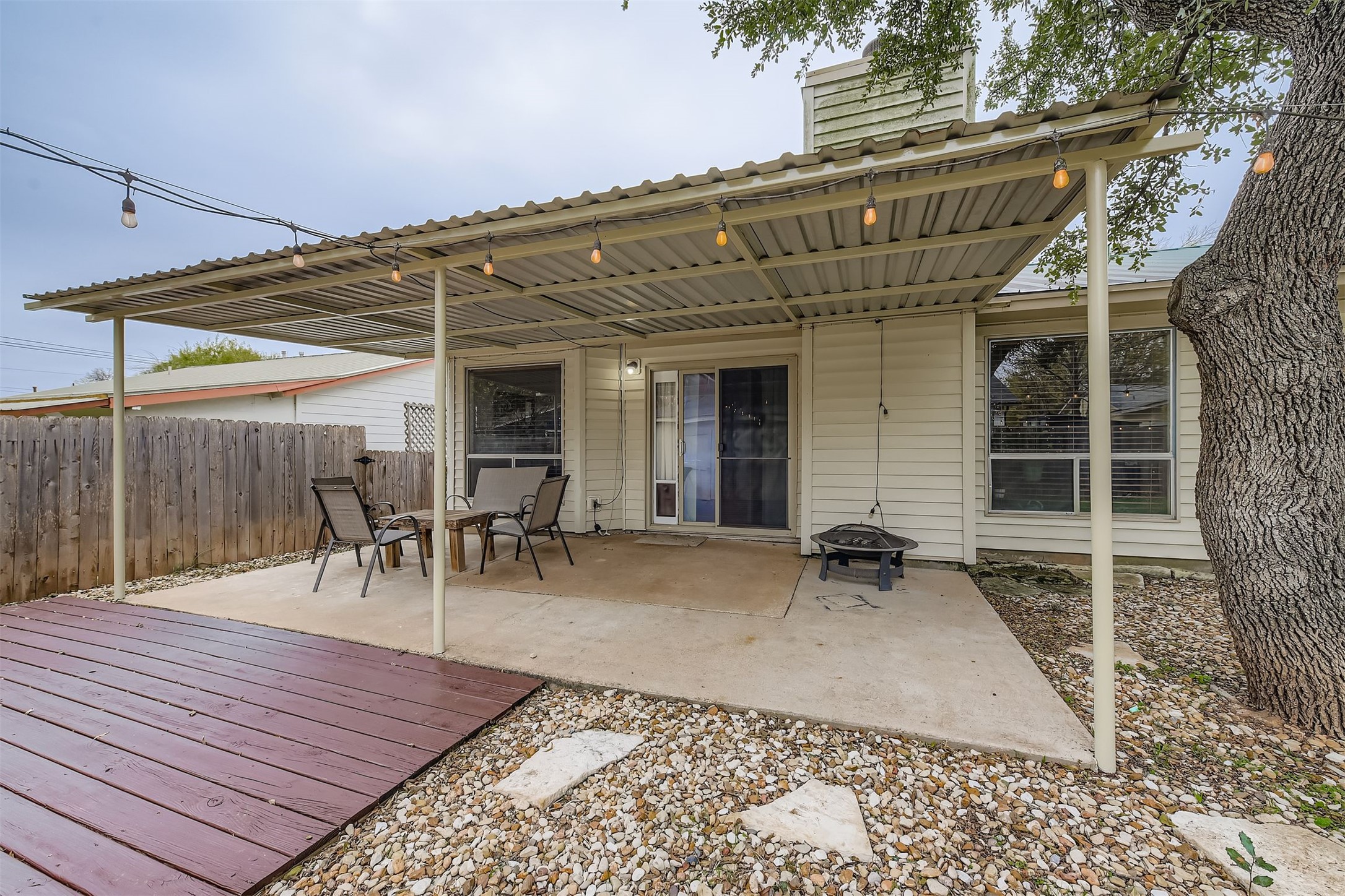 3104 Dominic Drive Austin, TX 78745 - Photo 24 of 28 View of patio / terrace featuring an outdoor fire pit and outdoor dining space
