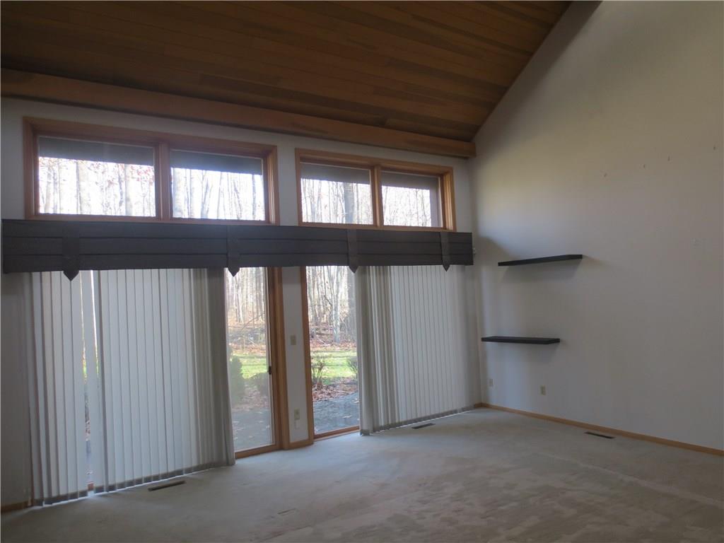 3680 McConnell Road Hermitage, PA 16148 - Photo 3 of 24 Beautiful sunken family room with vaulted ceiling and two story fireplace.