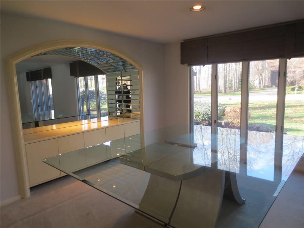 3680 McConnell Road Hermitage, PA 16148 - Photo 7 of 24 Gorgeous Dining Room with mirrored buffet and custom glass top table.