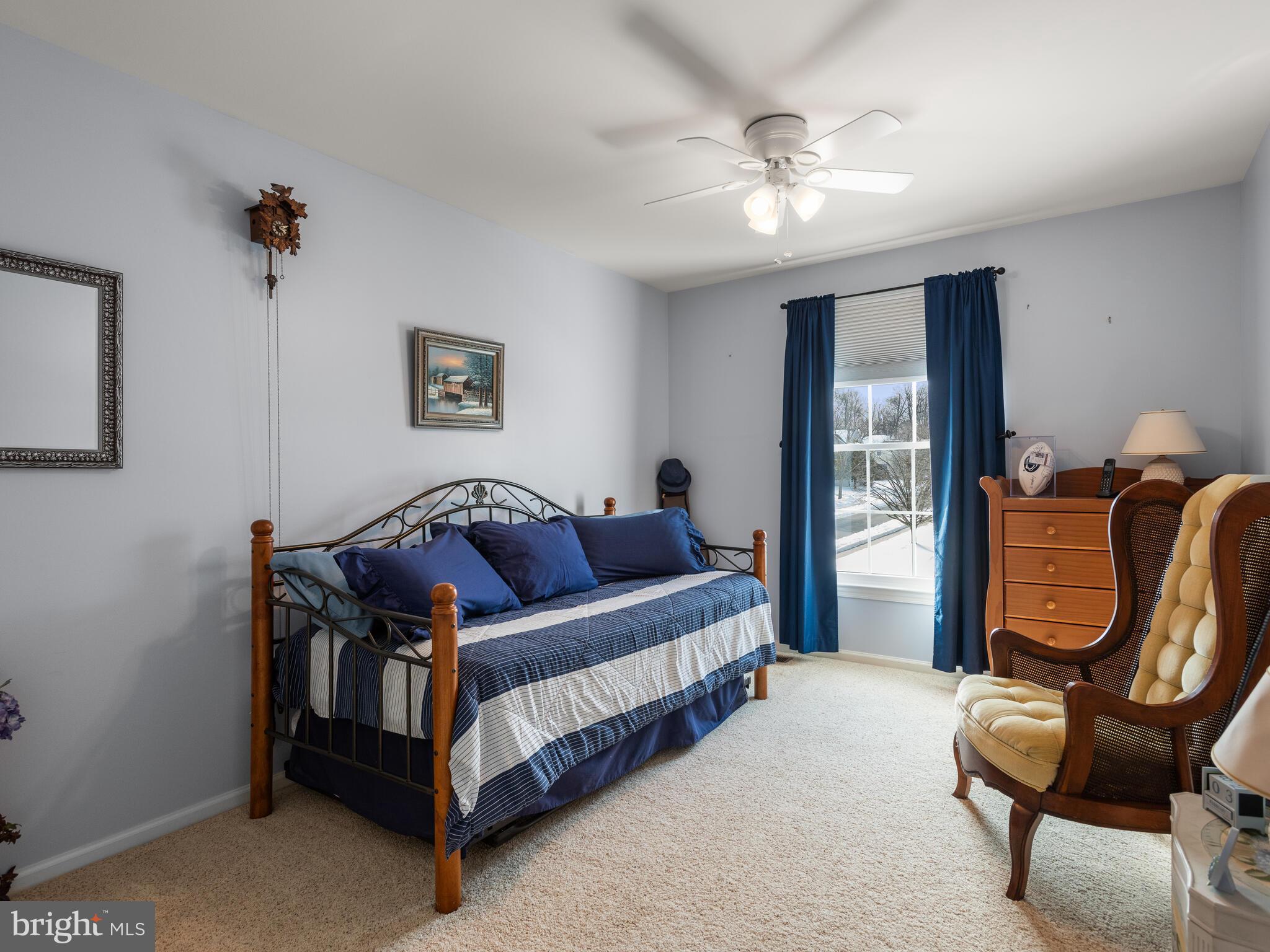 105 Hydrangea Way Coatesville, PA 19320 - Photo 18 of 26 a living room with furniture and a ceiling fan