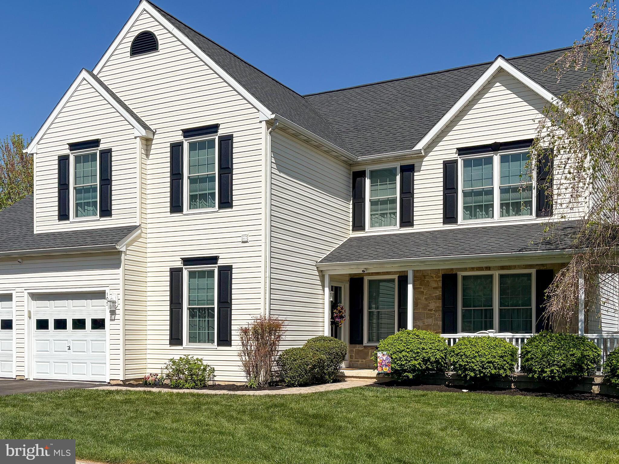 105 Hydrangea Way Coatesville, PA 19320 - Photo 2 of 26 a view of a house with a yard
