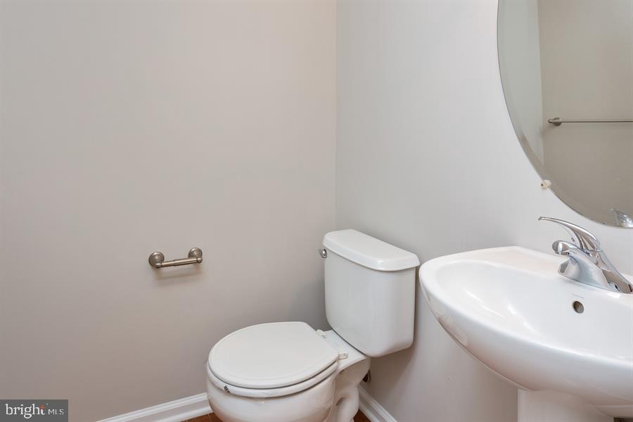 28 Blanchard Road Marlton, NJ 08053 - Photo 13 of 24 a white toilet sitting next to a white sink