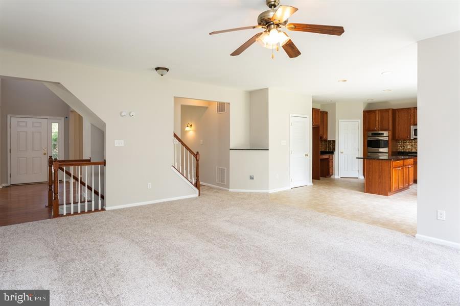 28 Blanchard Road Marlton, NJ 08053 - Photo 8 of 24 a view of a kitchen with a sink and a chandelier fan