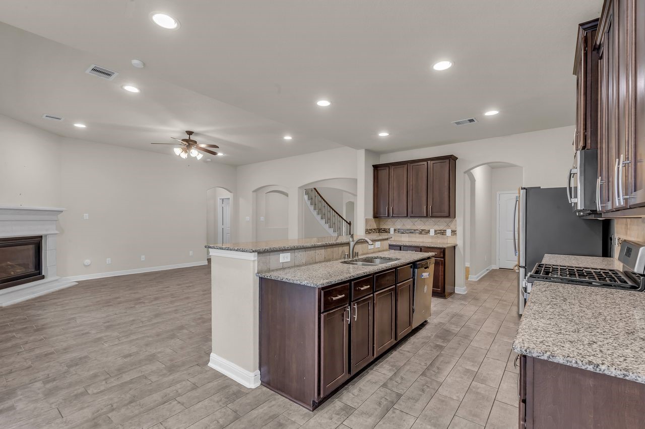 2739 Barrington Branch Drive Spring, TX 77373 - Photo 15 of 41 Kitchen with island and breakfast bar