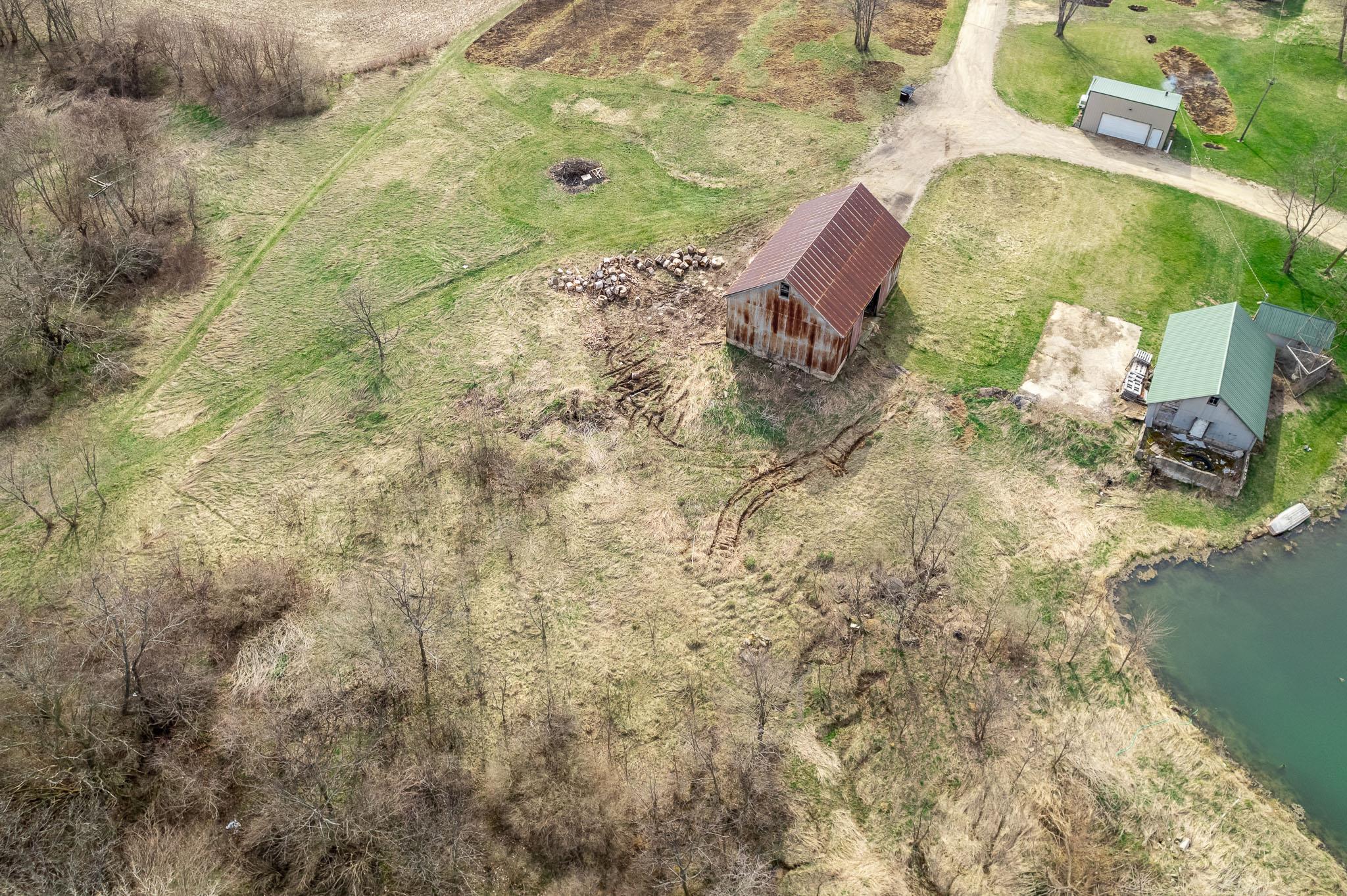 10760 East Rock Grove Road Davis, IL 61019 - Photo 17 of 91 a aerial view of a house with a yard
