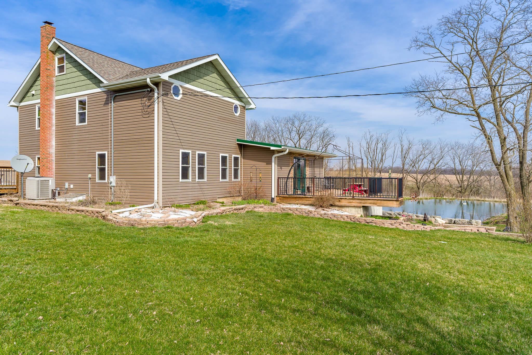 10760 East Rock Grove Road Davis, IL 61019 - Photo 24 of 91 a view of a house with a backyard