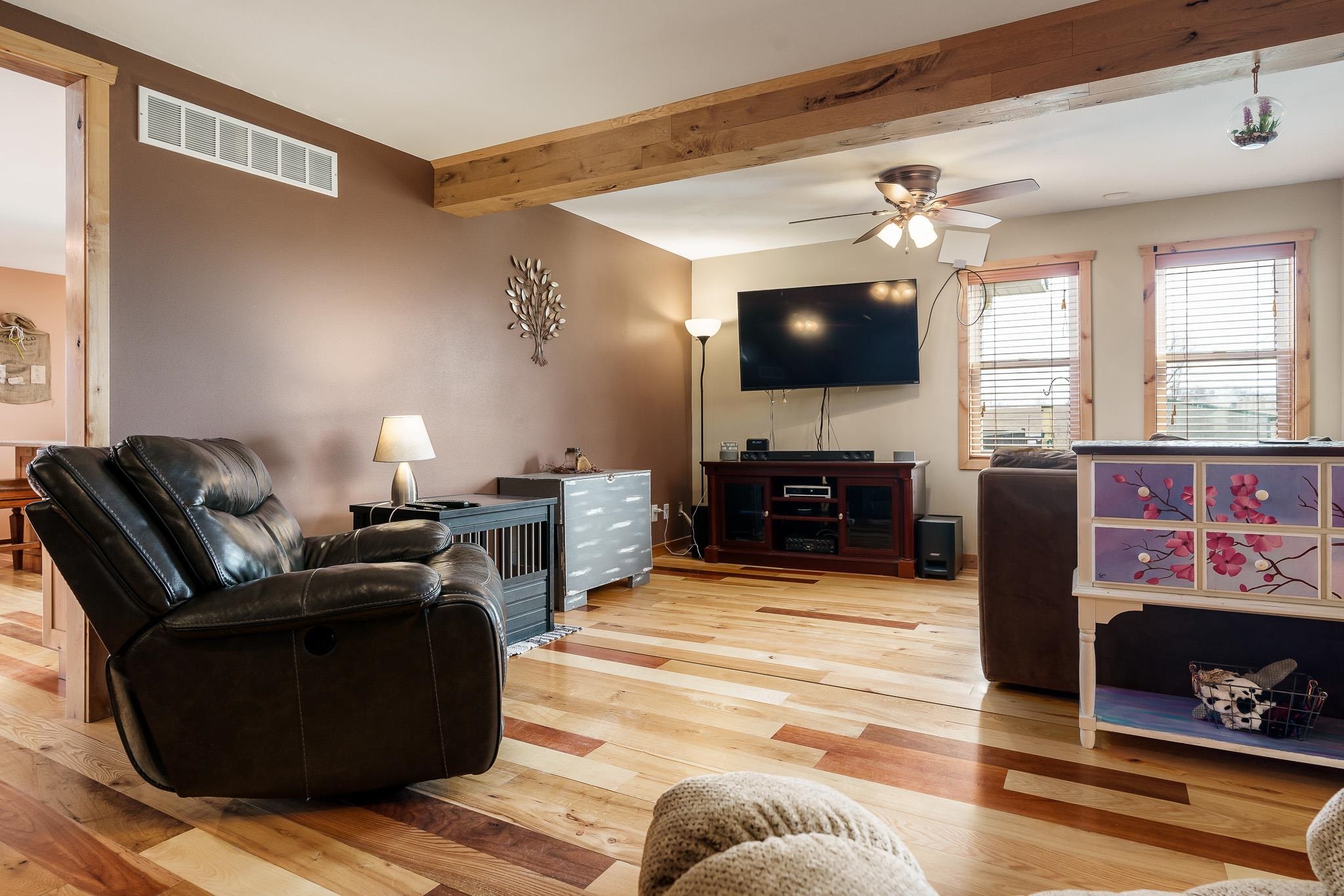 10760 East Rock Grove Road Davis, IL 61019 - Photo 53 of 91 a living room with furniture and a flat screen tv