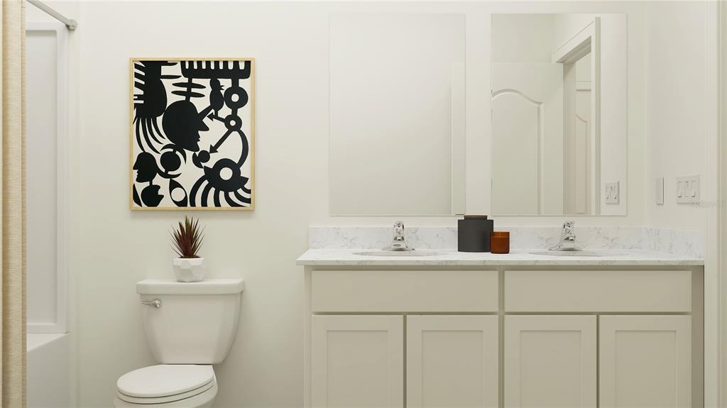 8675 Southwest 69th Terrace Ocala, FL 34476 - Photo 11 of 18 a bathroom with a sink and a mirror