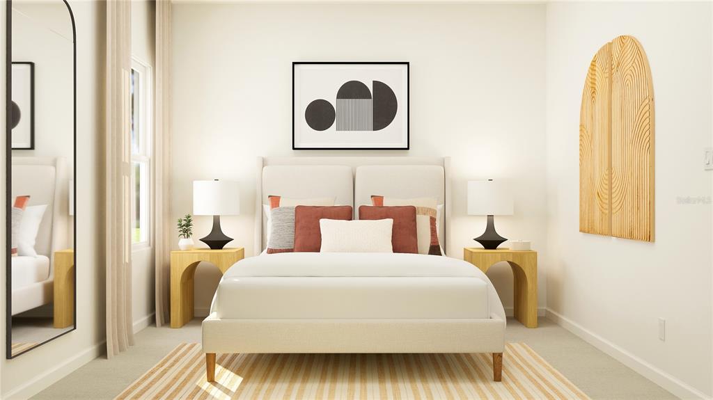 8675 Southwest 69th Terrace Ocala, FL 34476 - Photo 13 of 18 a bedroom with a bed and a painting on the wall