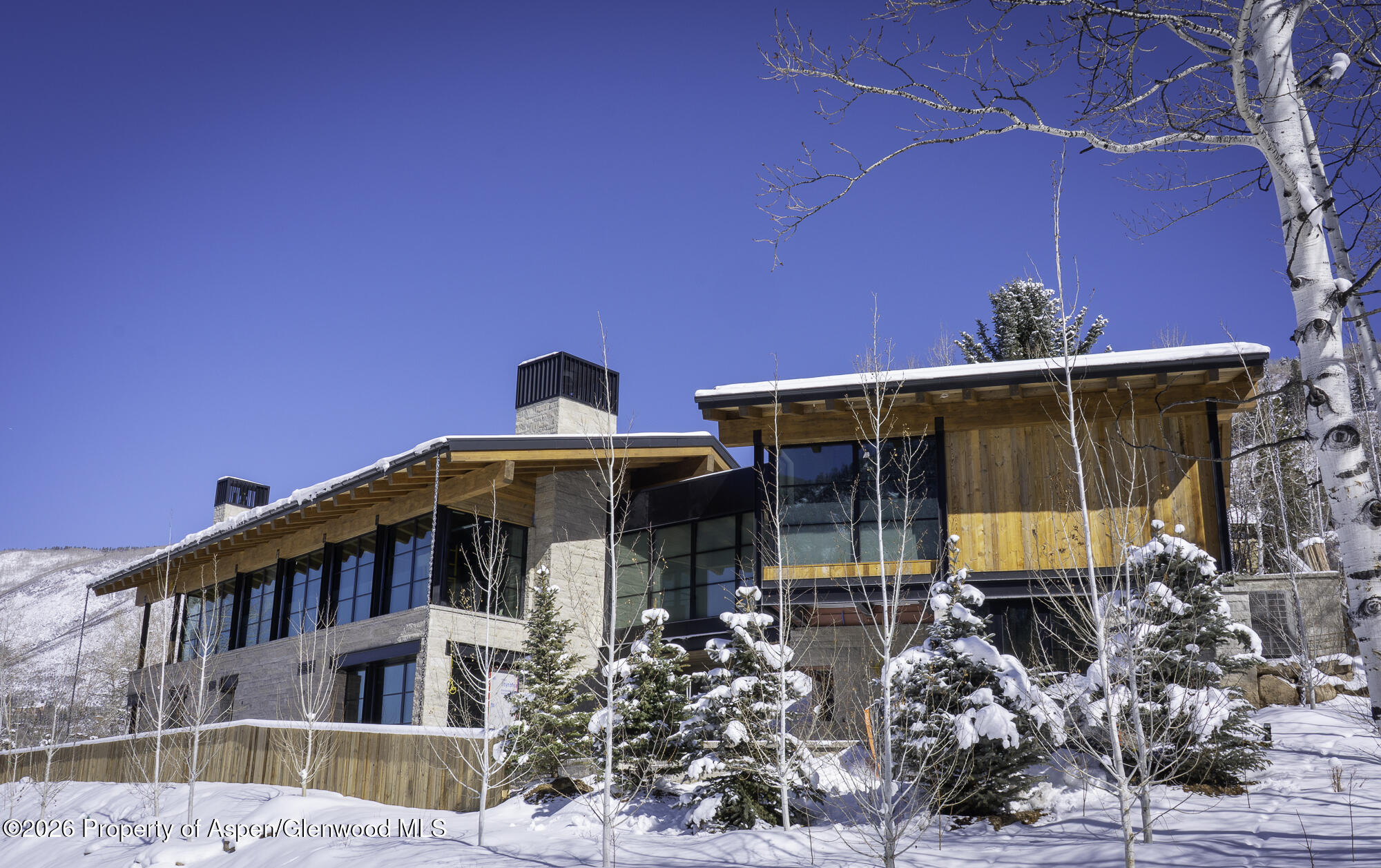 96 McSkimming Road Aspen, CO 81611 - Photo 2 of 16 a front view of a house with balcony
