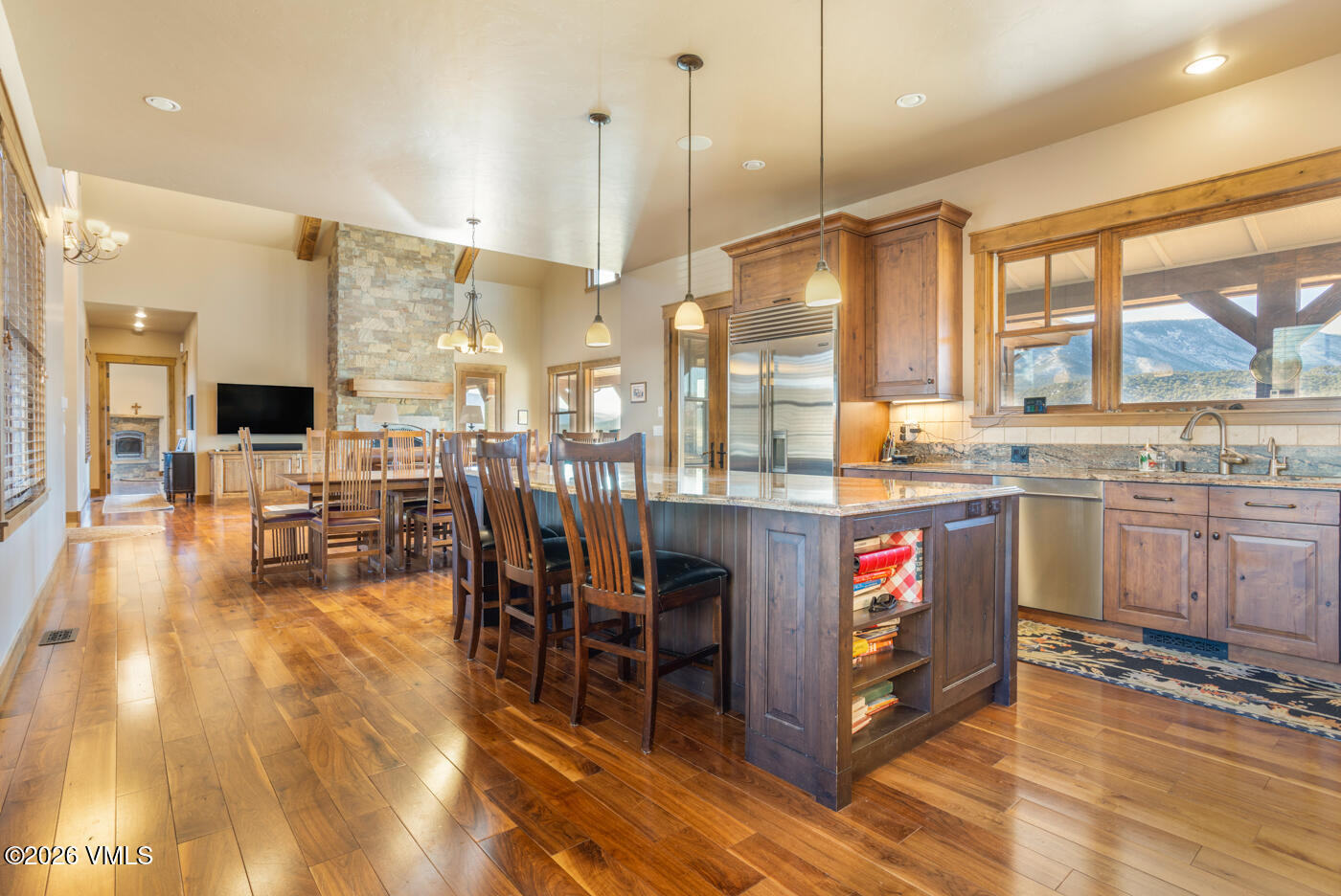 34900 Colorado River Road McCoy, CO 80463 - Photo 17 of 46 a large kitchen with lots of counter space and dining table