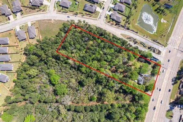 $1,050,000 | 6020 Highway 105, Conroe, TX 77304