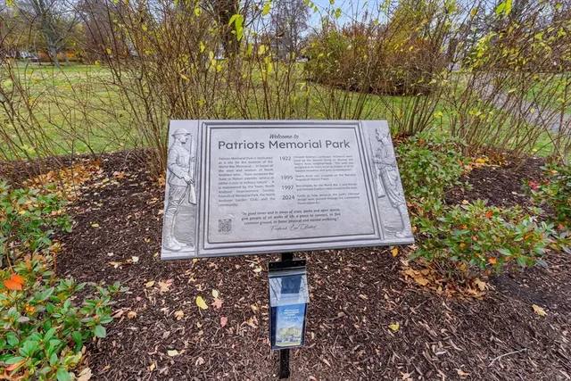 a sign on the side of the road