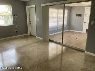 a view of an empty room and window