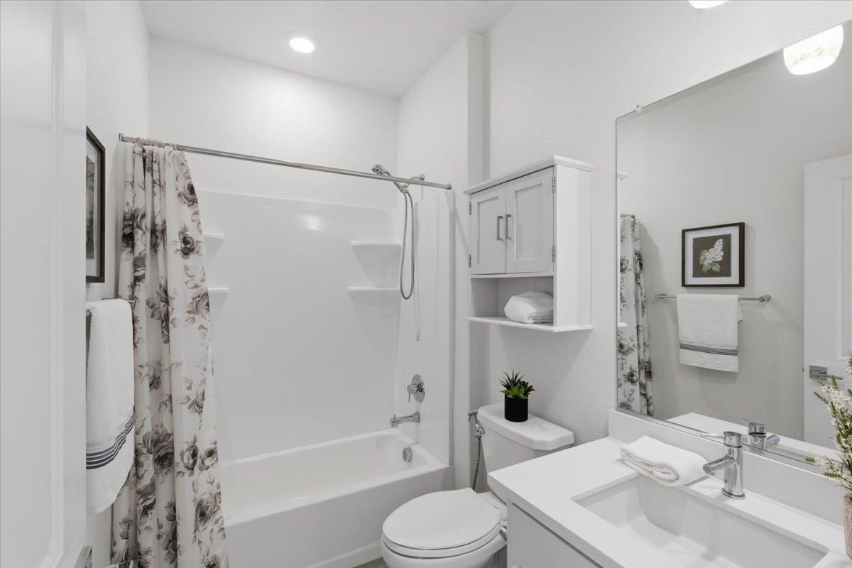 2481 Azalea Avenue Tracy, CA 95376 - Photo 12 of 31 a bathroom with a sink toilet and shower