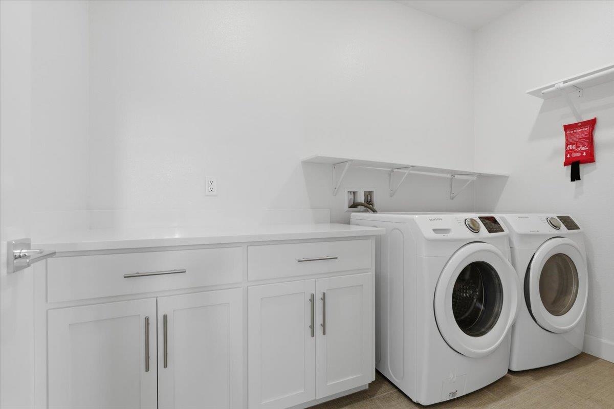 2481 Azalea Avenue Tracy, CA 95376 - Photo 22 of 31 a utility room with dryer and washer