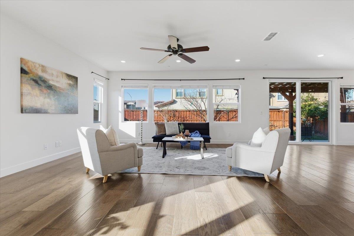2481 Azalea Avenue Tracy, CA 95376 - Photo 5 of 31 a living room with furniture and a large window