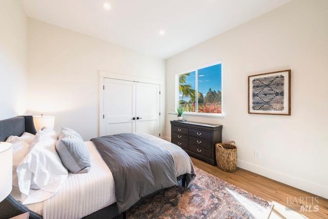 3485 Frei Road Sebastopol, CA 95472 - Photo 12 of 20 a bedroom with a bed and painting on the wall