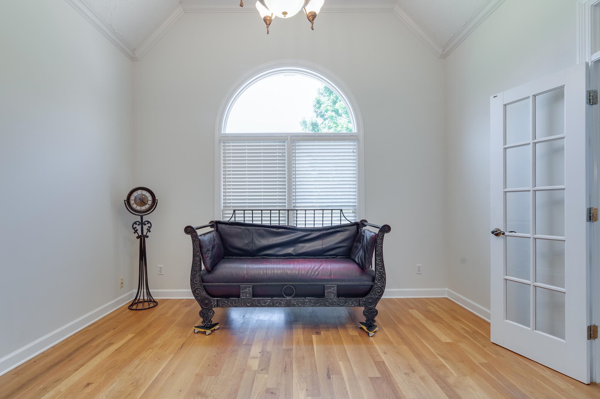 4306 Wind Tree Cove Bartlett, TN 38135 - Photo 3 of 28 a room with wooden floor and windows