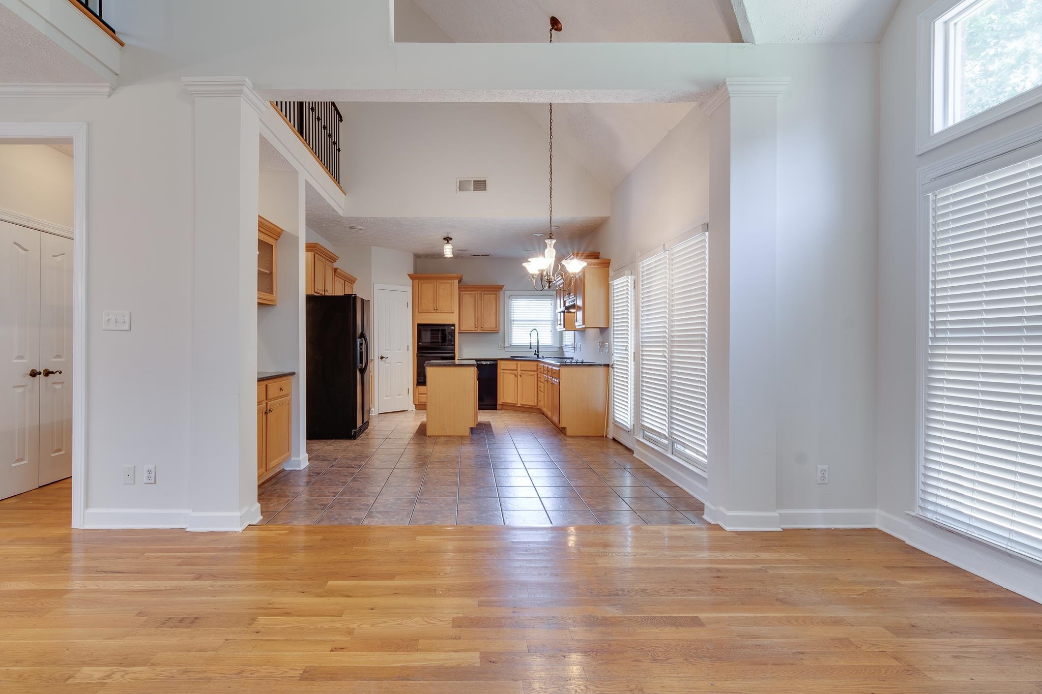 4306 Wind Tree Cove Bartlett, TN 38135 - Photo 8 of 28 a view of a kitchen with a refrigerator and a window