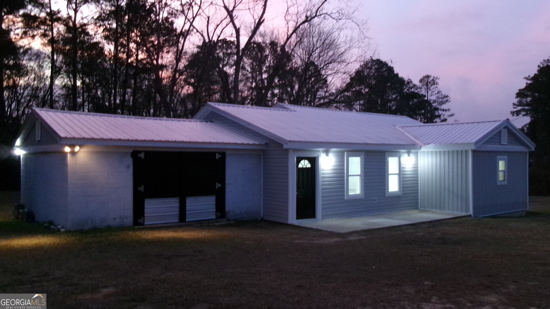 17827 Highway 129 Claxton, GA 30417 - Photo 1 of 21 a front view of a house with lots of green space