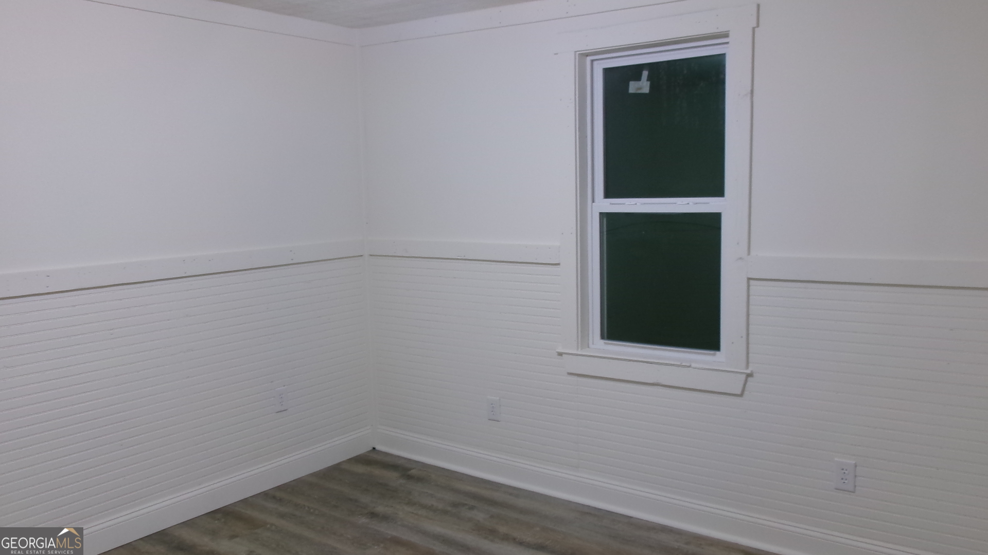 17827 Highway 129 Claxton, GA 30417 - Photo 14 of 21 a view of a small space with wooden floor and a window