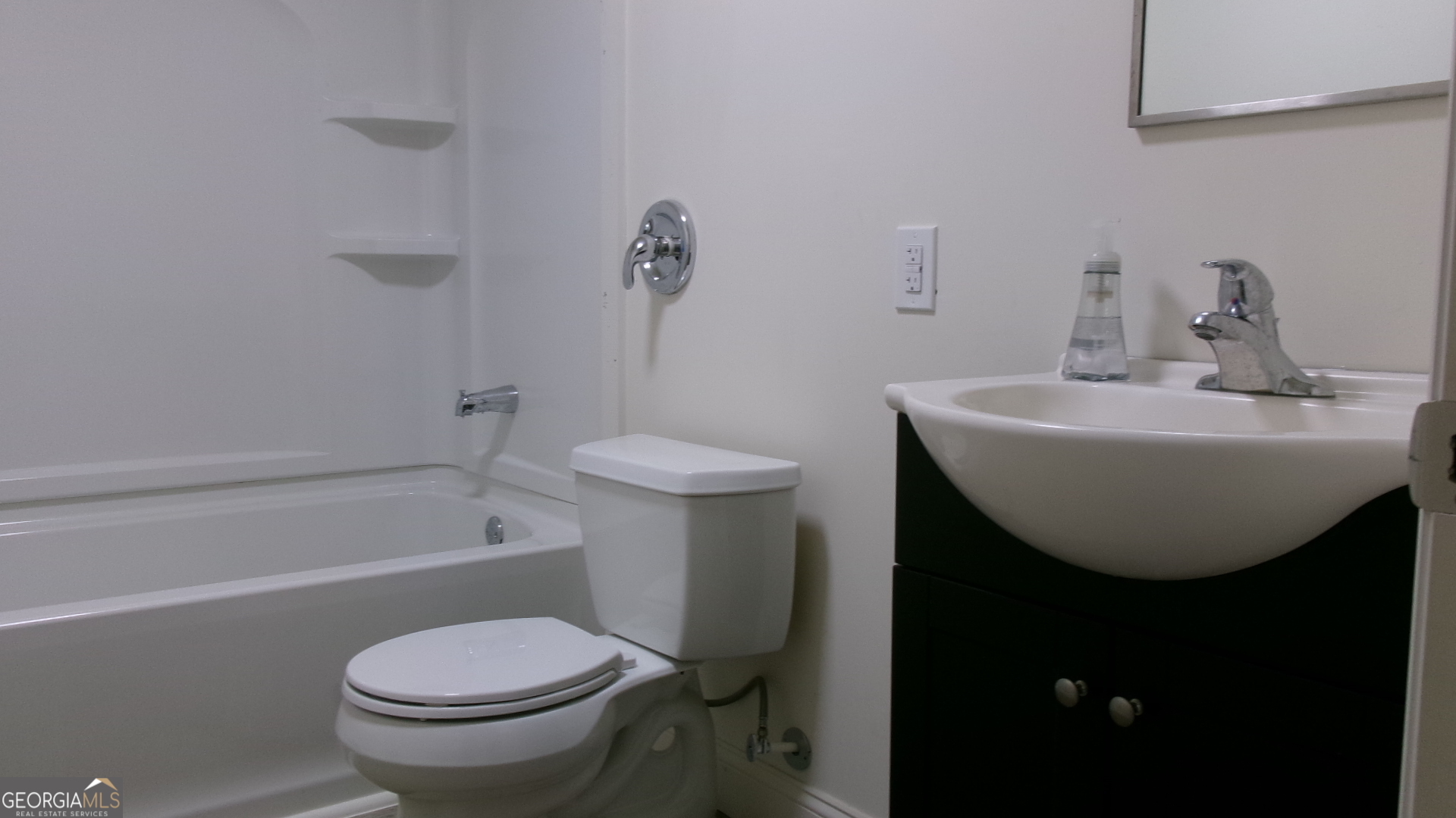 17827 Highway 129 Claxton, GA 30417 - Photo 15 of 21 a bathroom with a sink toilet and a bathtub