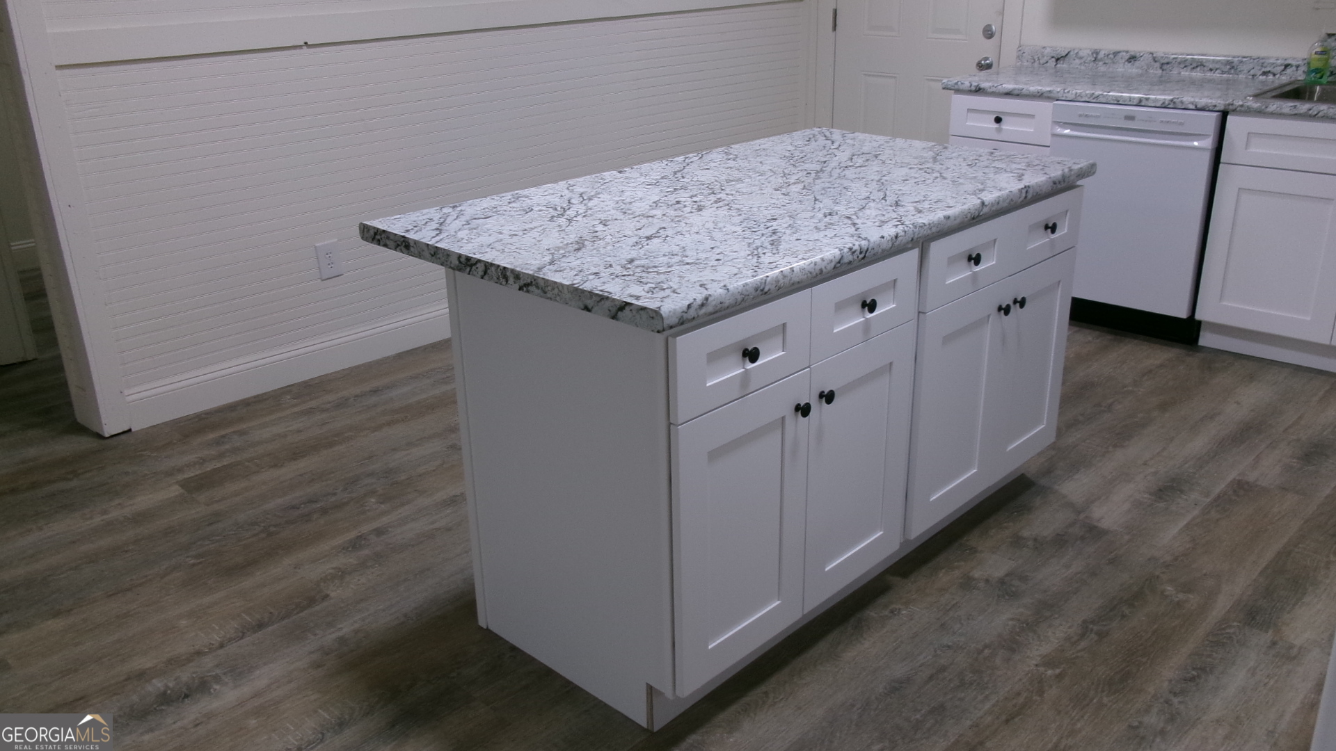 17827 Highway 129 Claxton, GA 30417 - Photo 18 of 21 a utility room with cabinets washer and dryer