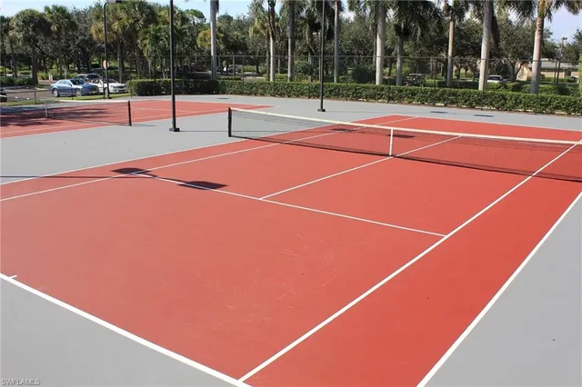 a tennis court that has tennis net
