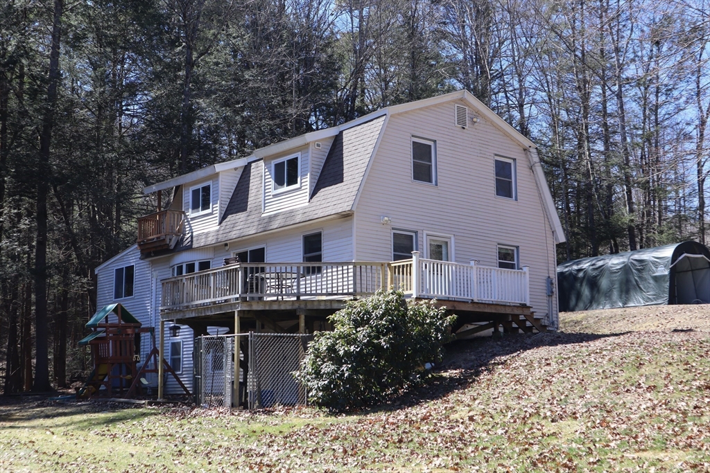 21 Chestnut Hill Road Orange, MA 01364 - Photo 1 of 37 a front view of a house with a yard