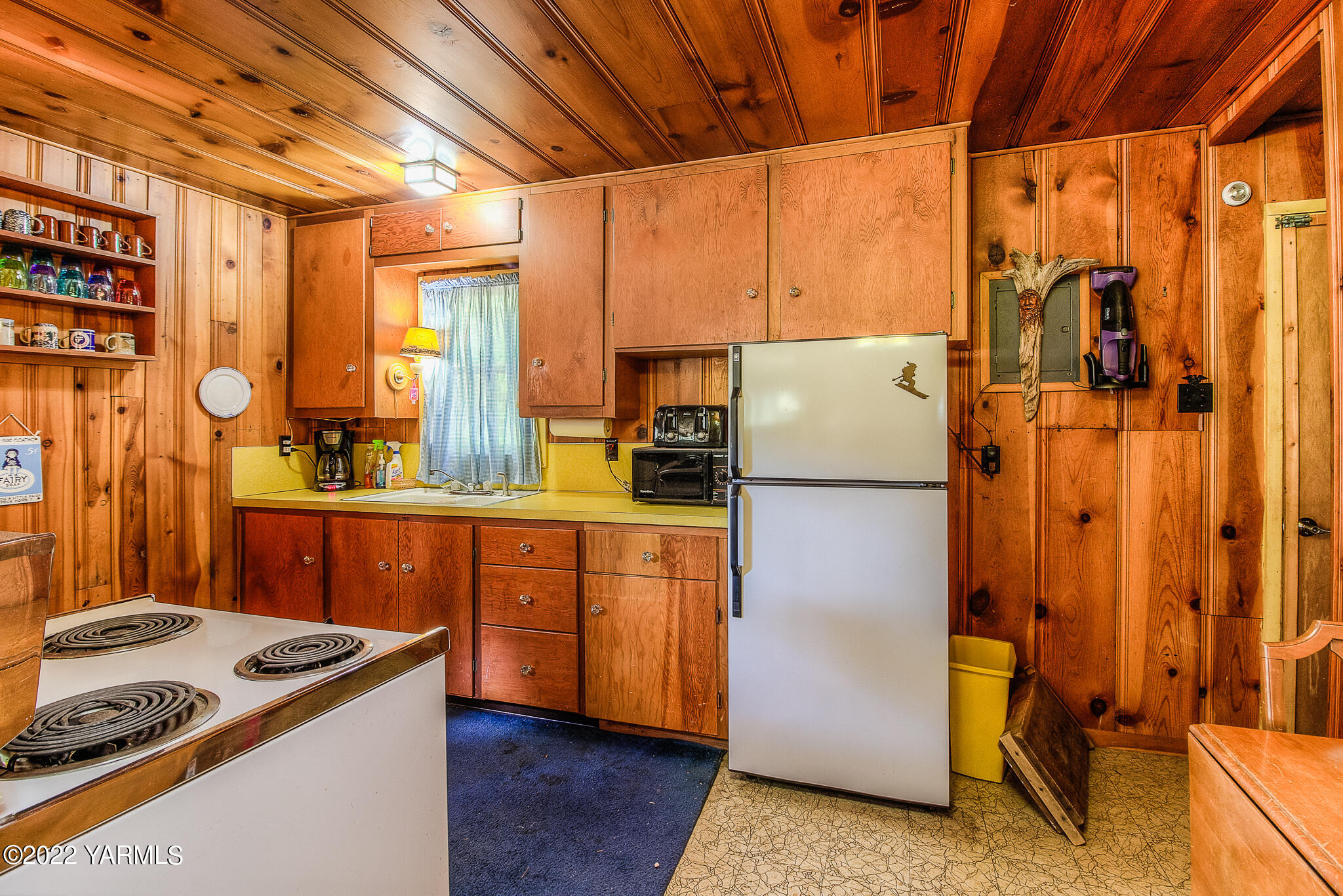 35941 Highway 12, Unit 12 Naches, WA 98937 - Photo 14 of 37 a kitchen with stainless steel appliances granite countertop a refrigerator a stove and a sink with wooden floor