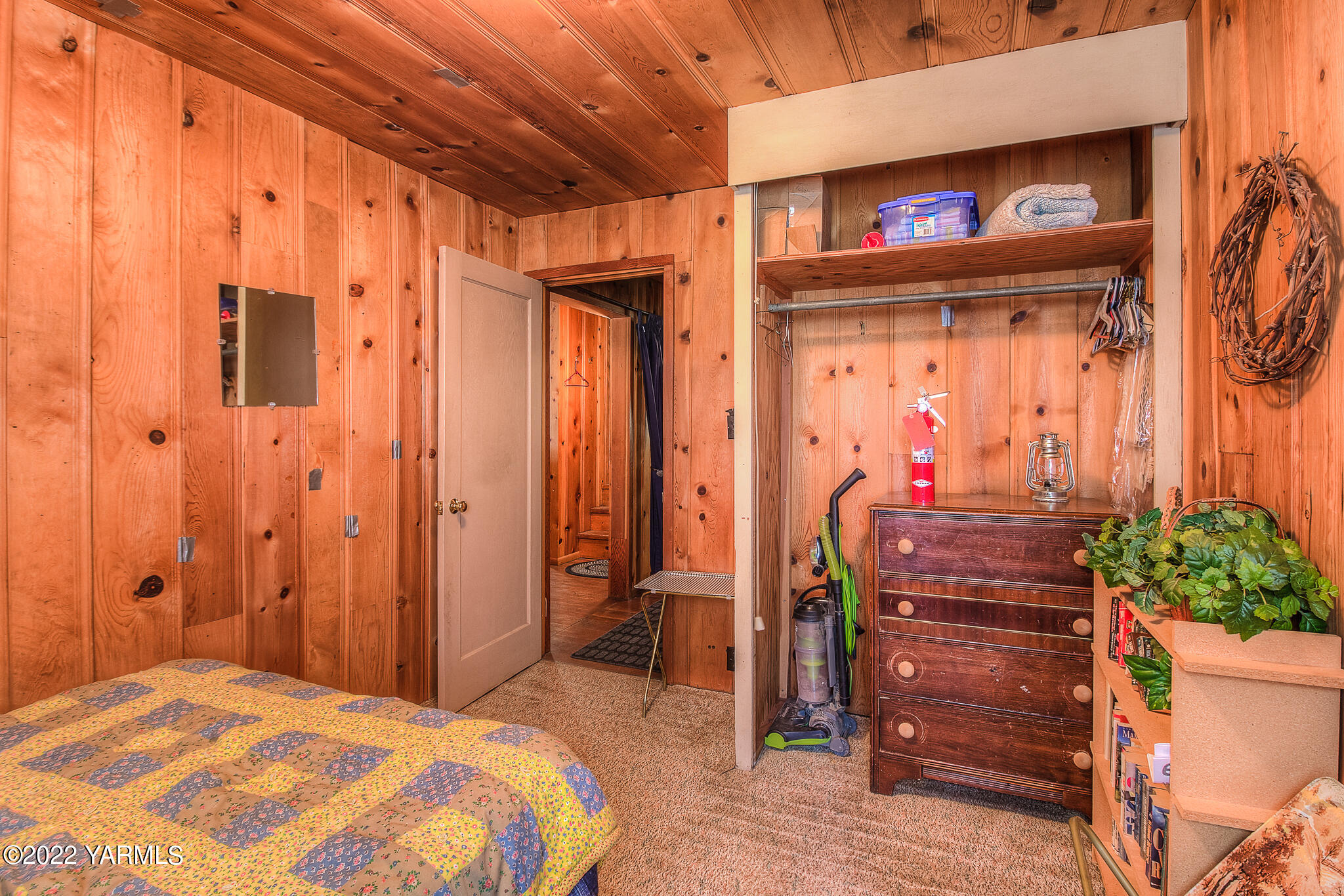 35941 Highway 12, Unit 12 Naches, WA 98937 - Photo 18 of 37 a bedroom with a bed and a table