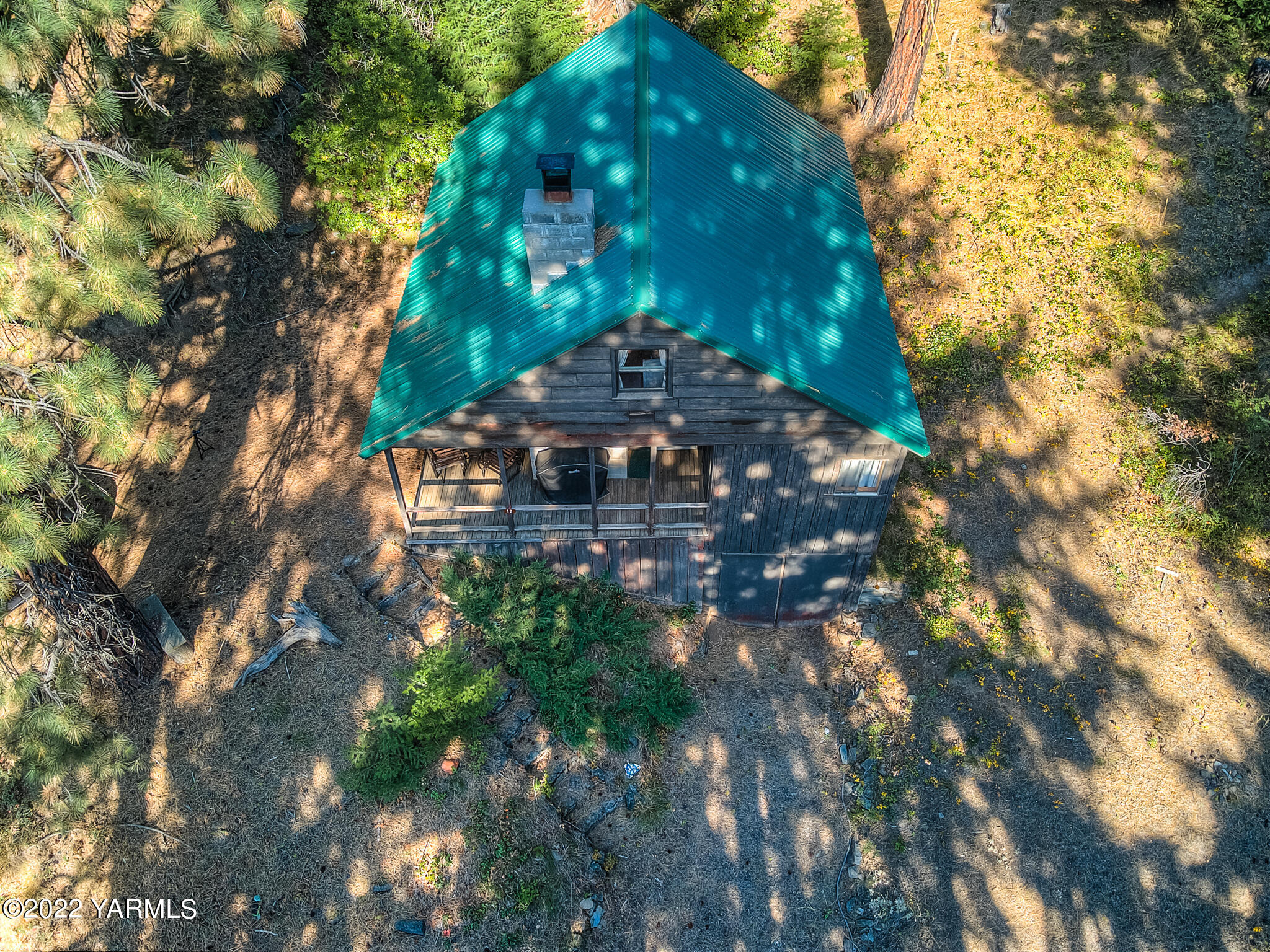 35941 Highway 12, Unit 12 Naches, WA 98937 - Photo 5 of 37 a view of a tree in front of a house