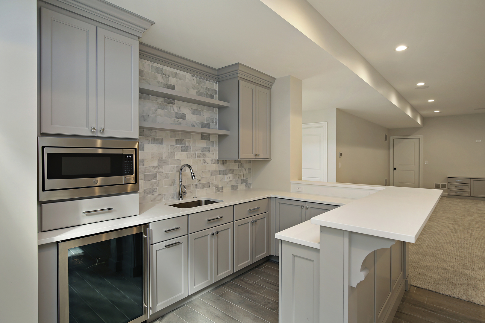 443 Hill Road Winnetka, IL 60093 - Photo 11 of 12 a kitchen that has a sink and a stove in it