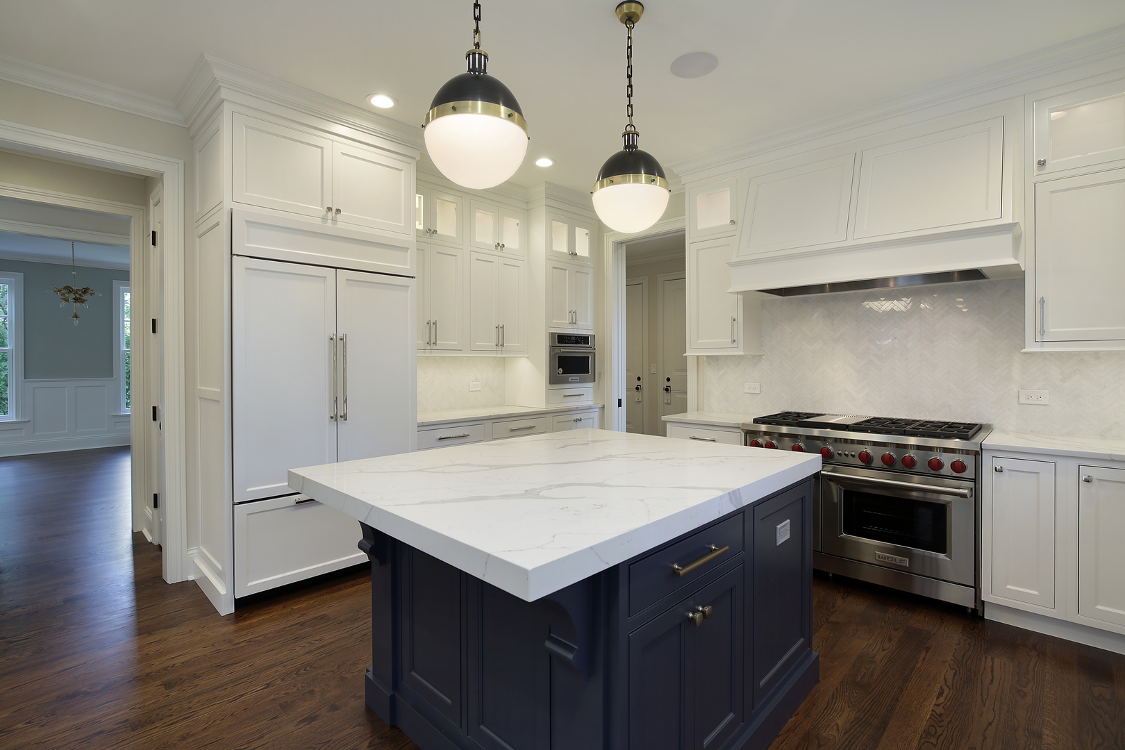 443 Hill Road Winnetka, IL 60093 - Photo 3 of 12 a kitchen with a stove and a wooden floor