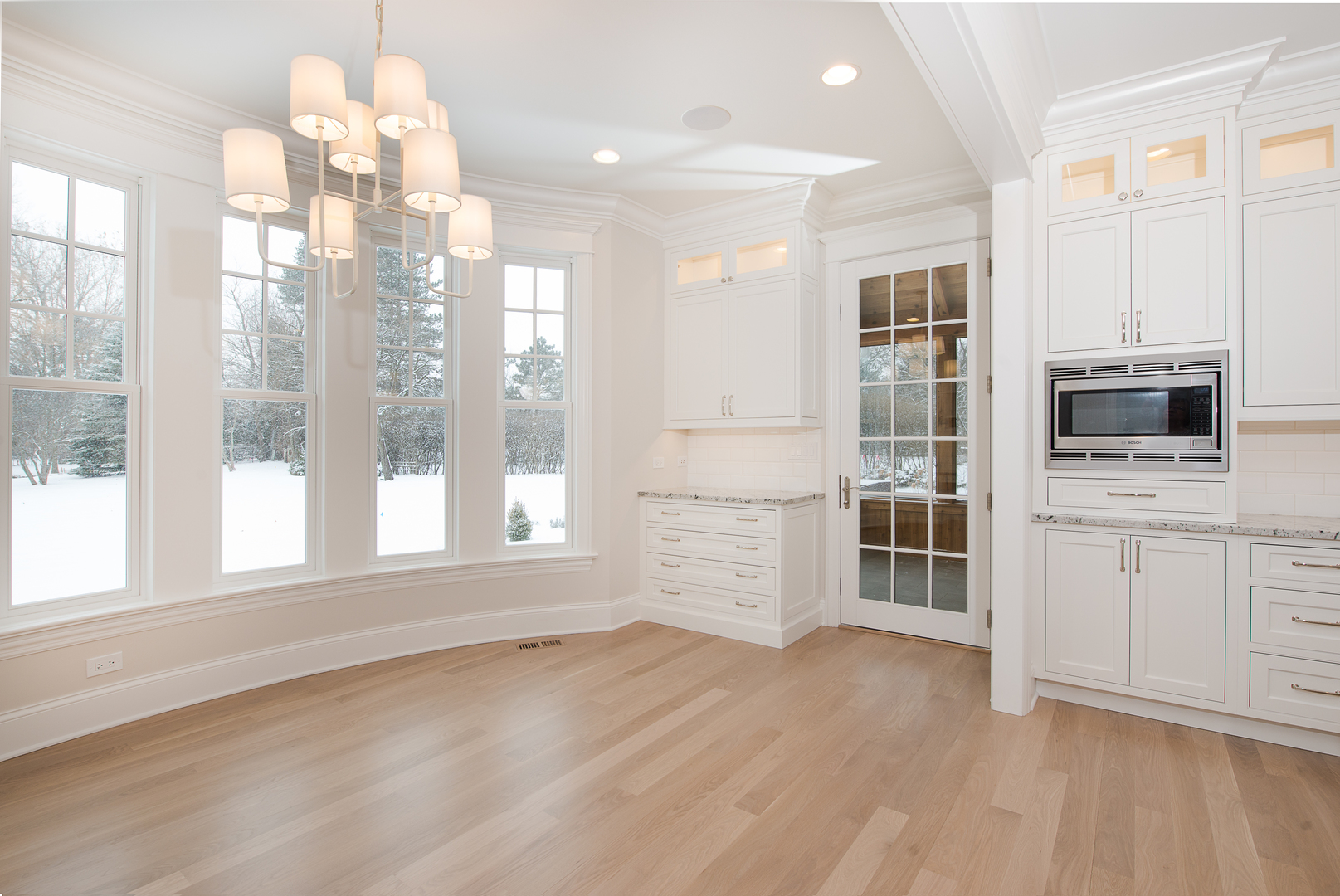 443 Hill Road Winnetka, IL 60093 - Photo 6 of 12 a view of a kitchen with an empty space and a window