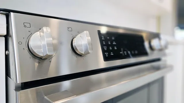 a living room with fireplace furniture and a large window