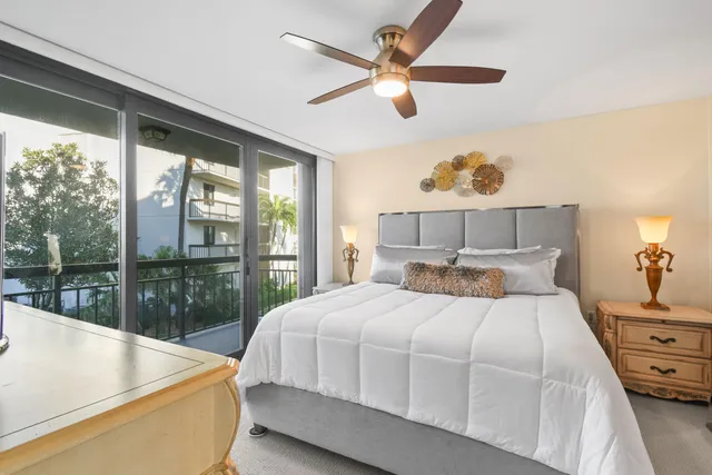 a bathroom with a double vanity sink mirror and shower