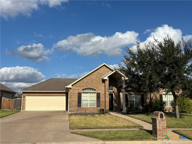 a front view of house with yard