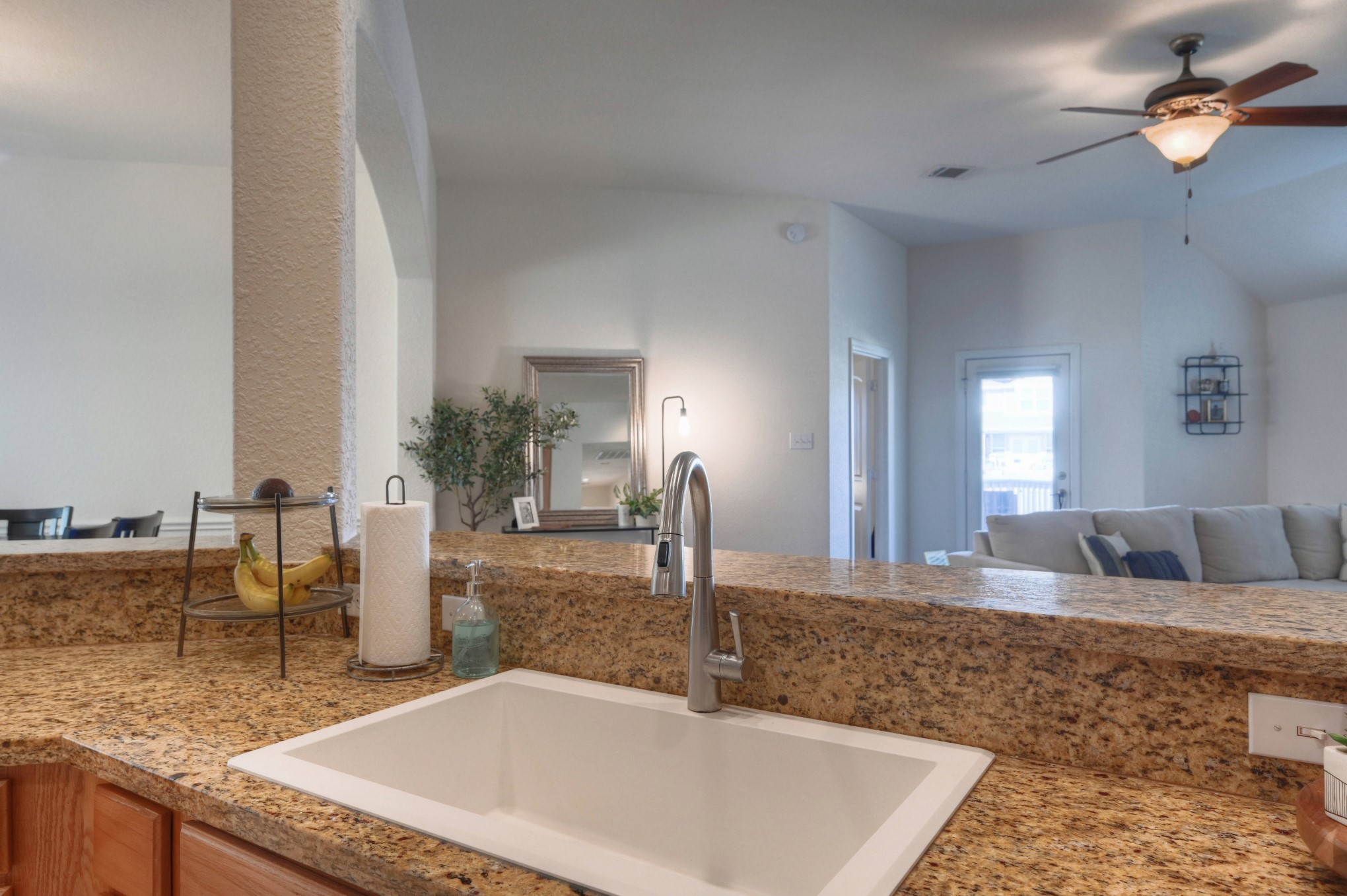 108 Cove Circle Conroe, TX 77356 - Photo 20 of 50 Discover the kitchen's latest upgrades – a spacious, deep, seamless sink paired with a stylish, modern faucet. This dynamic duo brings both practicality and contemporary flair to your culinary space.